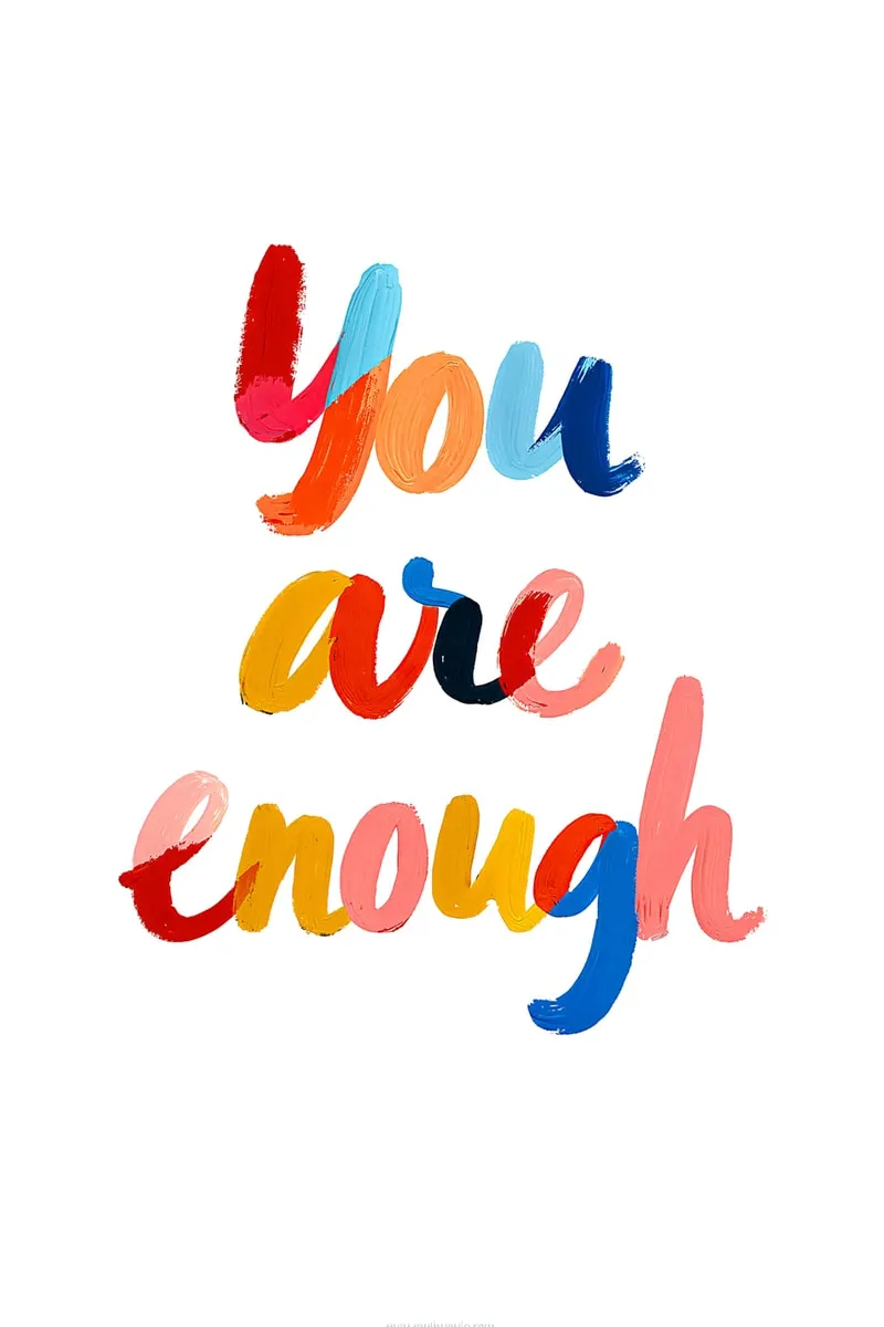 Der Schriftzug You are enough in bunten, handgemalten Ölfarben-Strichen auf weißem Hintergrund.